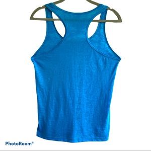 - Over The Limit woman’s tank top size small.